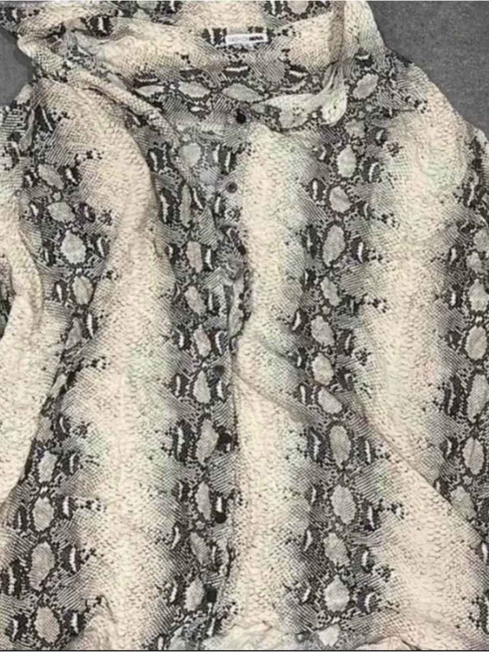 Women snake print button top